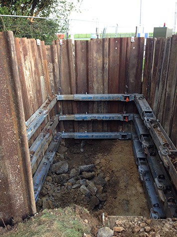 Install shoring and concrete base - 2