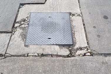 2-Concrete-around-Different-Manhole-Broken