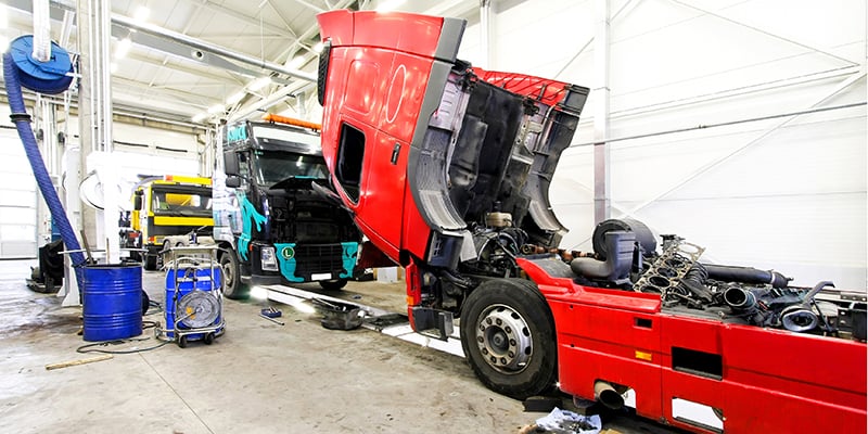 hgv getting maintenance in a garage